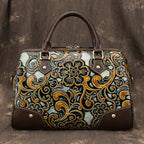 Decorative handbag with intricate patterns on a textured background