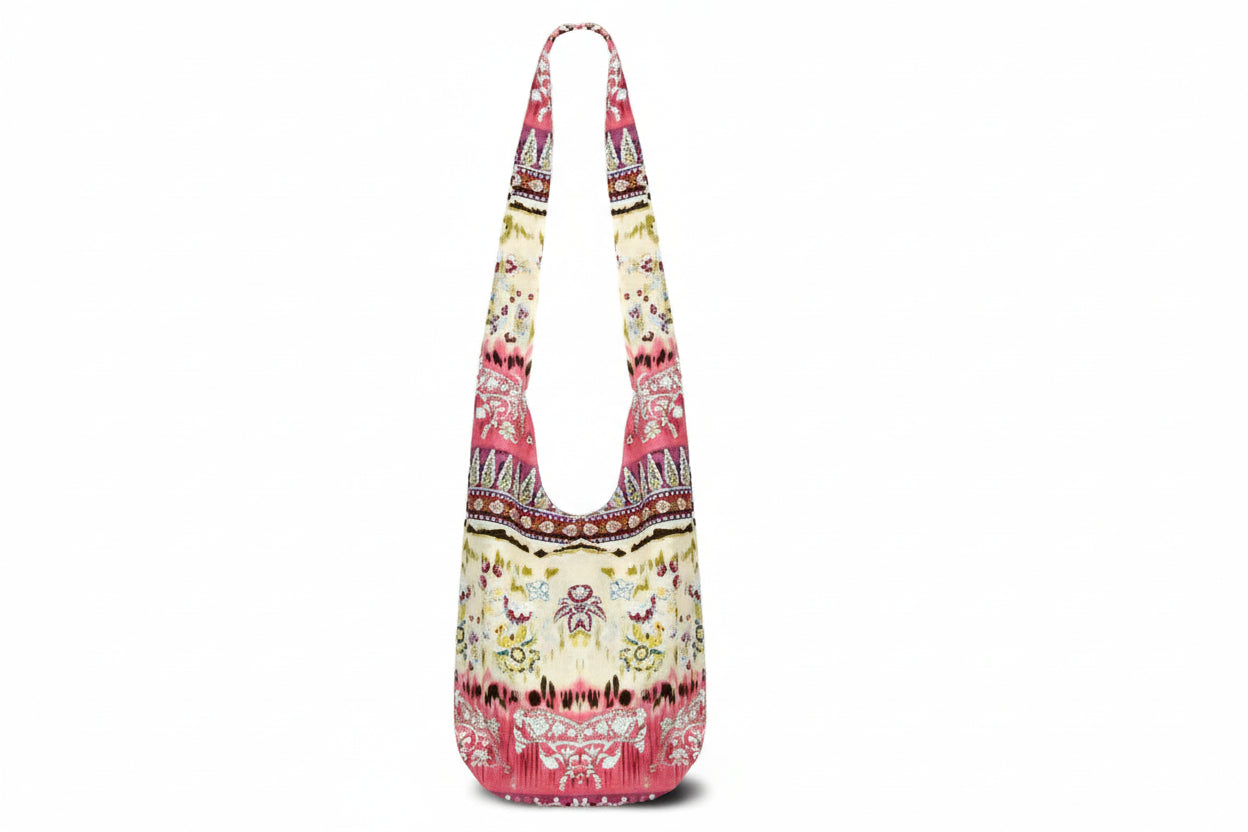 Colorful patterned shoulder bag on a white background
