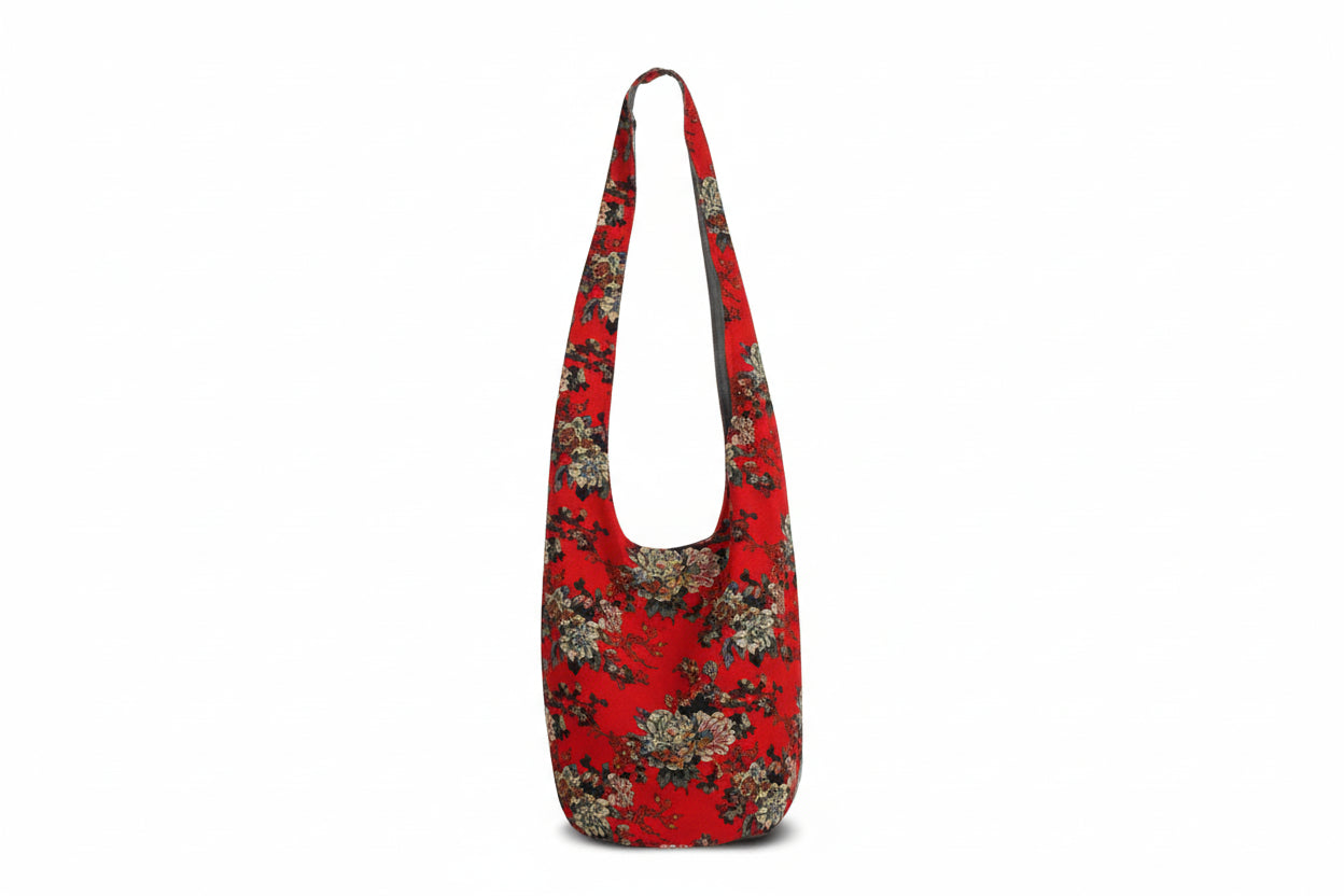 Red floral patterned bag on a white background
