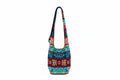 Colorful handbag with floral patterns on a white background
