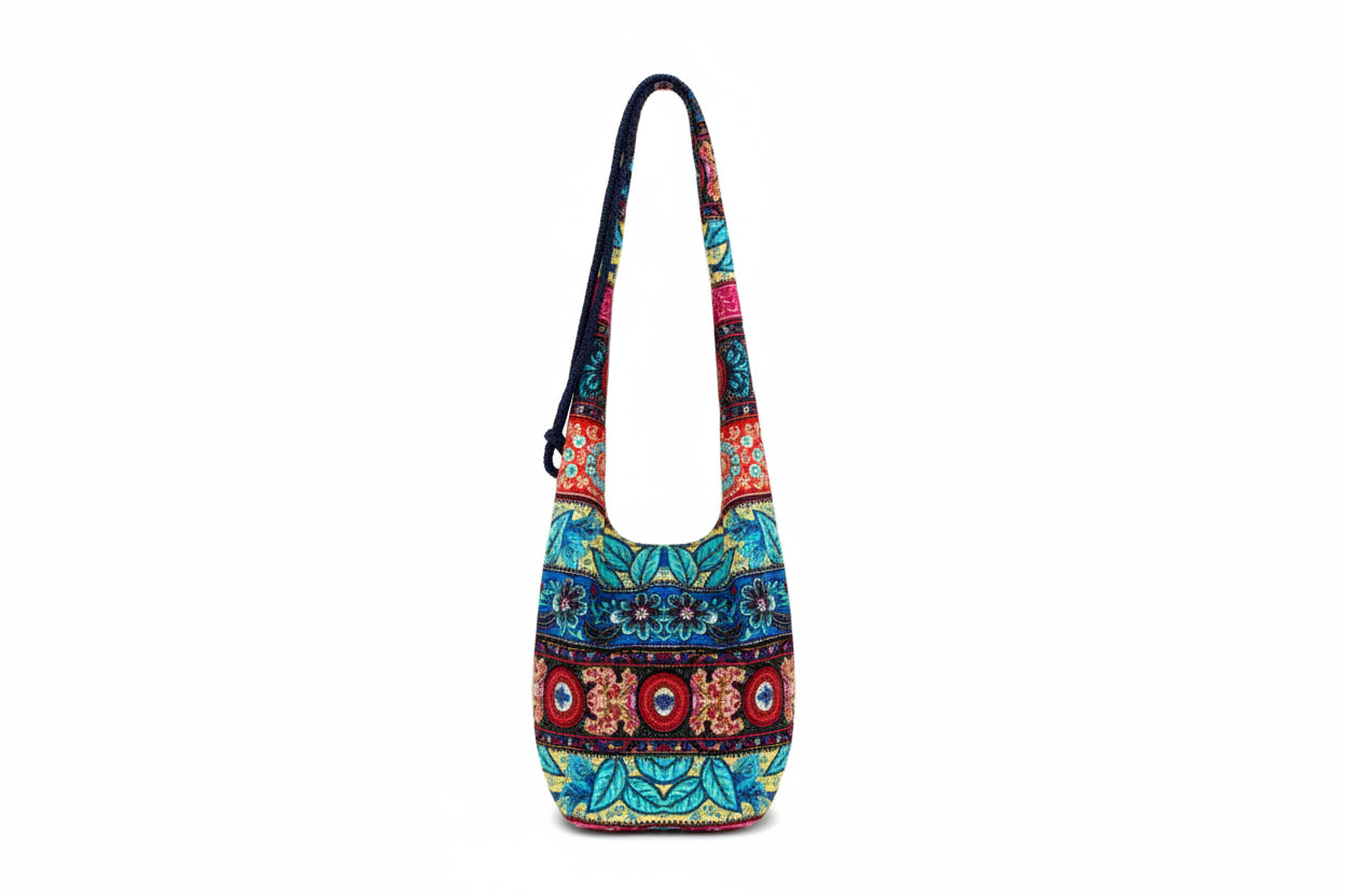 Colorful handbag with floral patterns on a white background