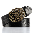 Black belt with floral gold buckle on a white background