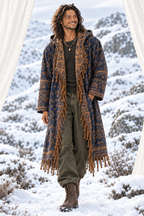 Male model in navy and gold Kia cloak with refined stubble